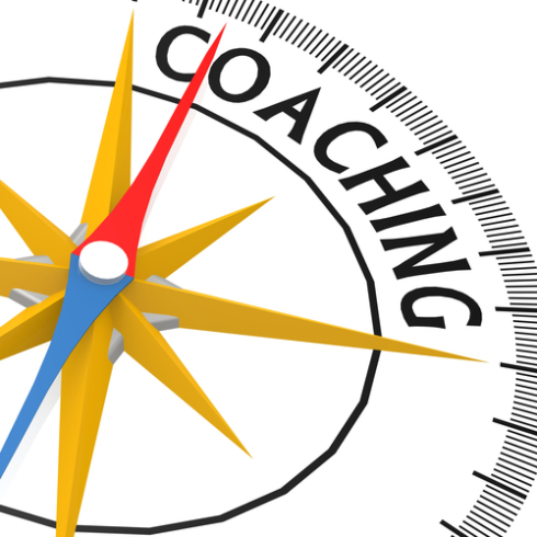 Compass with coaching word